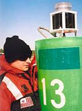 FN Greg Panas holding with Model 701 on buoy
