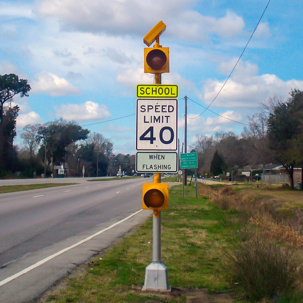 carmanah solar-powered school zone speed sign beacon on round pole in south carolina