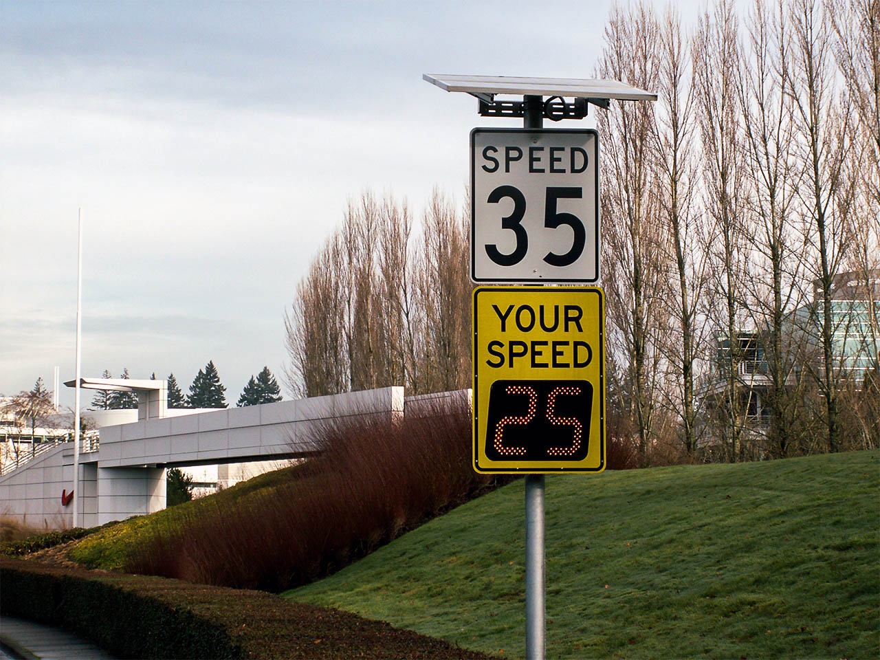 speedcheck solar-powered radar speed sign installation with digits flashing 25
